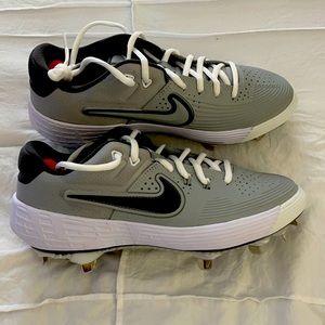 NIKE CLEATS U. S. SIZE 7 1/2M.   BRAND NEW!
